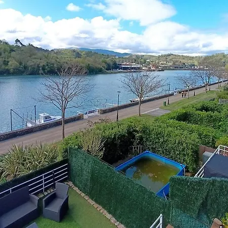 Holiday home Adosado En *